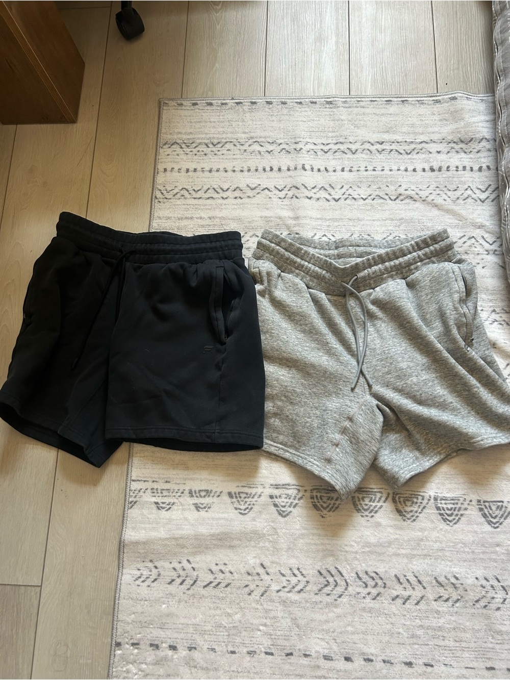 2 Pairs of Fabletics Men's Athletic Drawstring Shorts - Black & Light Gray